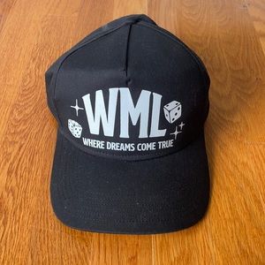Wish Me Luck black trucker hat